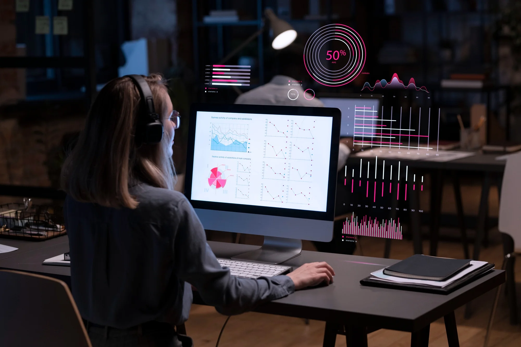 A woman wearing headphones working at a computer in a dark office, viewing complex financial data visualizations and futuristic holographic charts on her screen for portfolio optimisation.